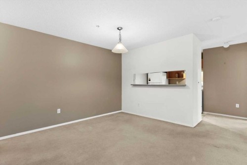 2113-2113 Tuscarora Manor Nw, Calgary, AB - Indoor Photo Showing Other Room