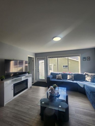 1028 Taradale Drive Ne, Calgary, AB - Indoor Photo Showing Living Room