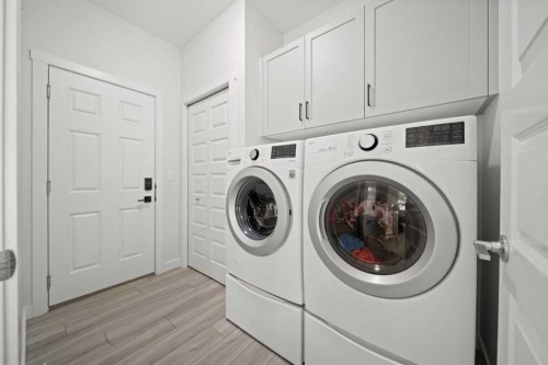 50 Bayview Circle Sw, Airdrie, AB - Indoor Photo Showing Laundry Room