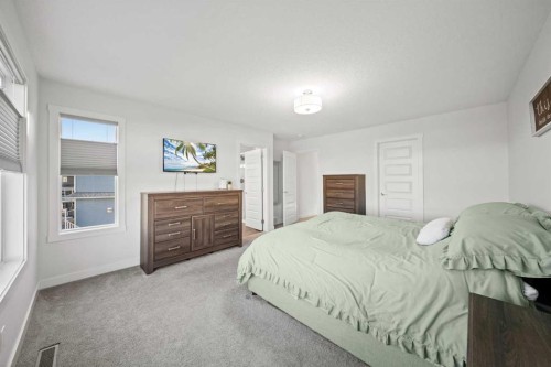 50 Bayview Circle Sw, Airdrie, AB - Indoor Photo Showing Bedroom