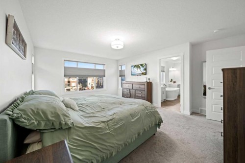 50 Bayview Circle Sw, Airdrie, AB - Indoor Photo Showing Bedroom