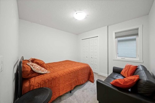 50 Bayview Circle Sw, Airdrie, AB - Indoor Photo Showing Bedroom