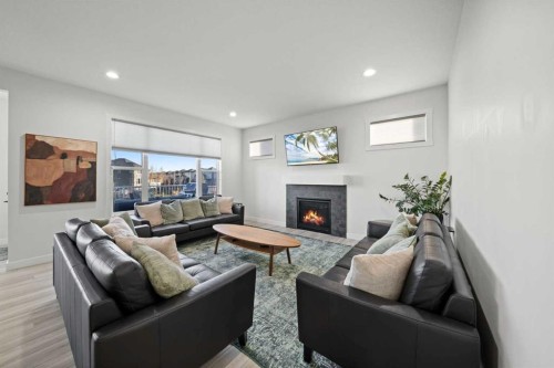 50 Bayview Circle Sw, Airdrie, AB - Indoor Photo Showing Living Room With Fireplace
