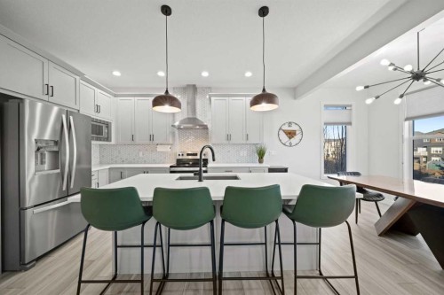 50 Bayview Circle Sw, Airdrie, AB - Indoor Photo Showing Kitchen With Upgraded Kitchen