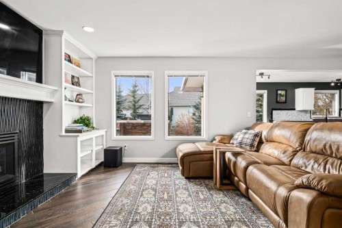 296 Lakeside Greens Crescent, Chestermere, AB - Indoor Photo Showing Living Room With Fireplace