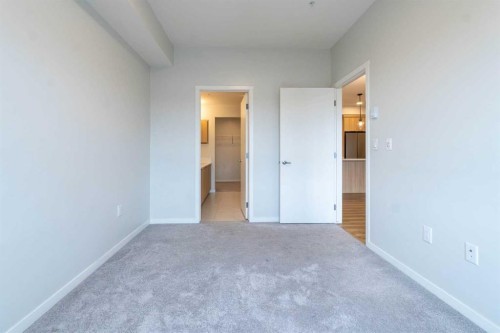 327-360 Harvest Hills Way Ne, Calgary, AB - Indoor Photo Showing Other Room