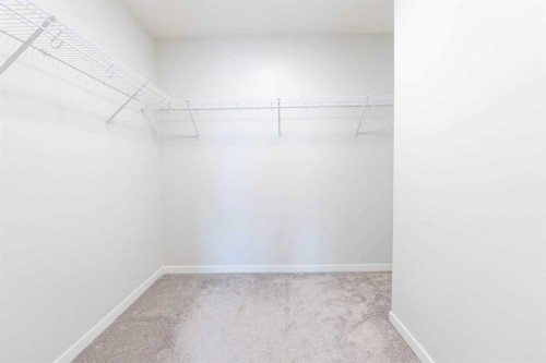 327-360 Harvest Hills Way Ne, Calgary, AB - Indoor With Storage