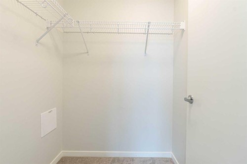 327-360 Harvest Hills Way Ne, Calgary, AB - Indoor With Storage
