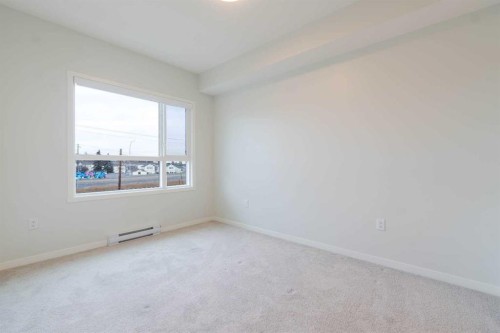 327-360 Harvest Hills Way Ne, Calgary, AB - Indoor Photo Showing Other Room