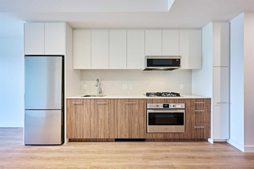 1012-730 2 Avenue Sw, Calgary, AB - Indoor Photo Showing Kitchen With Stainless Steel Kitchen