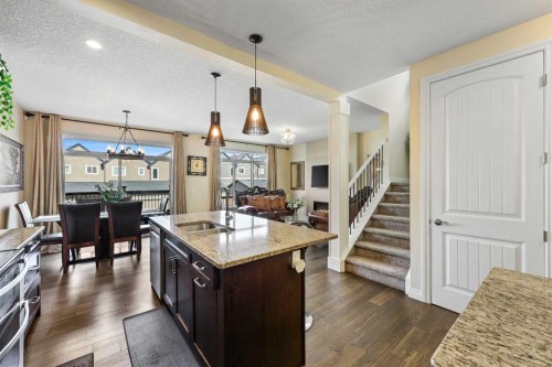 340 Lawthorn Way Se, Airdrie, AB - Indoor Photo Showing Kitchen With Double Sink