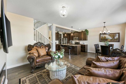 340 Lawthorn Way Se, Airdrie, AB - Indoor Photo Showing Living Room