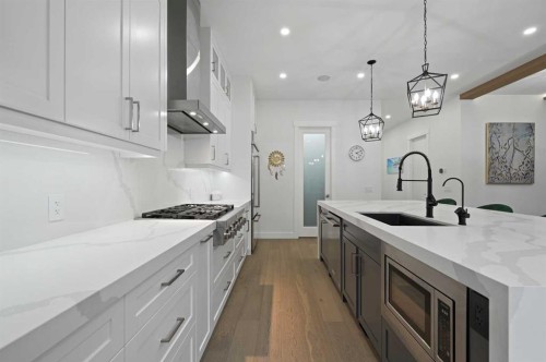 7250 Elkton Drive Sw, Calgary, AB - Indoor Photo Showing Kitchen With Upgraded Kitchen