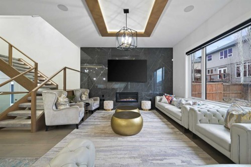 7250 Elkton Drive Sw, Calgary, AB - Indoor Photo Showing Other Room With Fireplace