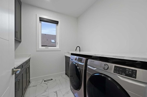 7250 Elkton Drive Sw, Calgary, AB - Indoor Photo Showing Laundry Room