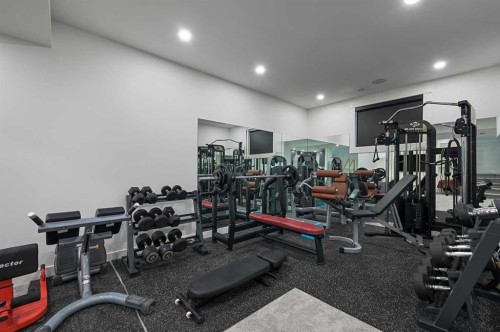 7250 Elkton Drive Sw, Calgary, AB - Indoor Photo Showing Gym Room
