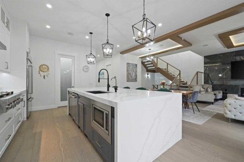 7250 Elkton Drive Sw, Calgary, AB - Indoor Photo Showing Kitchen With Upgraded Kitchen