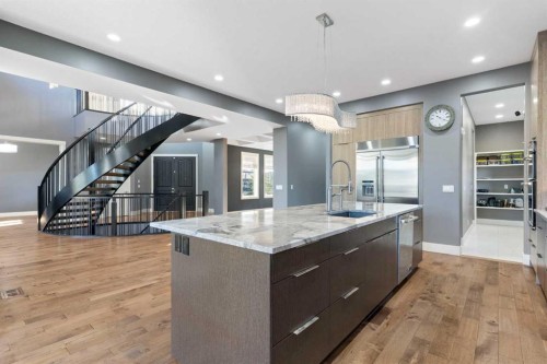 67 Stoneypointe Place, Rural Rocky View County, AB - Indoor Photo Showing Kitchen With Upgraded Kitchen