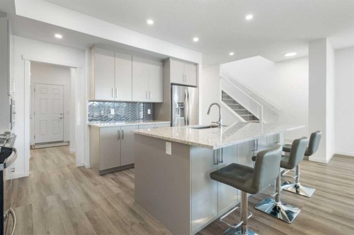 248 Masters Row Se, Calgary, AB - Indoor Photo Showing Kitchen With Upgraded Kitchen