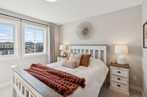 377 Sundown Road, Cochrane, AB - Indoor Photo Showing Bedroom