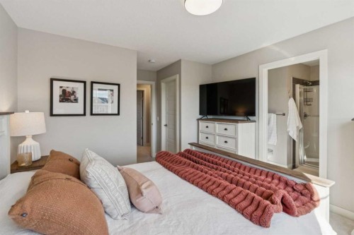 377 Sundown Road, Cochrane, AB - Indoor Photo Showing Bedroom