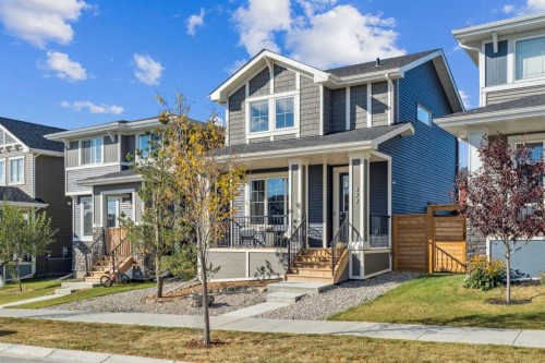 377 Sundown Road, Cochrane, AB - Outdoor With Facade