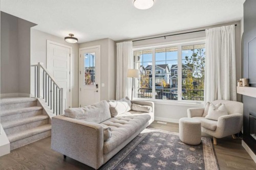 377 Sundown Road, Cochrane, AB - Indoor Photo Showing Living Room