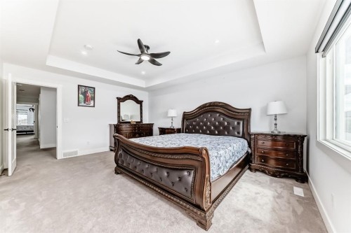 127 Saddlecrest Grove Ne, Calgary, AB - Indoor Photo Showing Bedroom
