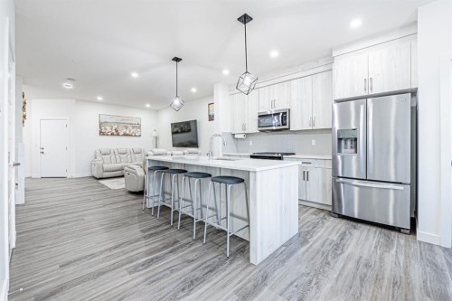 112 Midtown Close Sw, Airdrie, AB - Indoor Photo Showing Kitchen With Stainless Steel Kitchen With Upgraded Kitchen