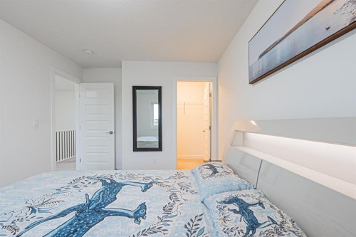 112 Midtown Close Sw, Airdrie, AB - Indoor Photo Showing Bedroom