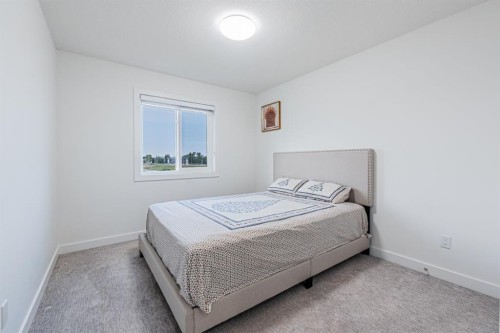 112 Midtown Close Sw, Airdrie, AB - Indoor Photo Showing Bedroom