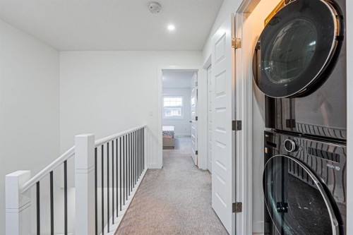 112 Midtown Close Sw, Airdrie, AB - Indoor Photo Showing Laundry Room