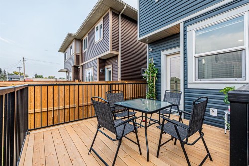 112 Midtown Close Sw, Airdrie, AB - Outdoor With Deck Patio Veranda With Exterior