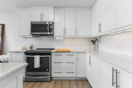 443 Sage Hill Grove Nw, Calgary, AB - Indoor Photo Showing Kitchen With Upgraded Kitchen