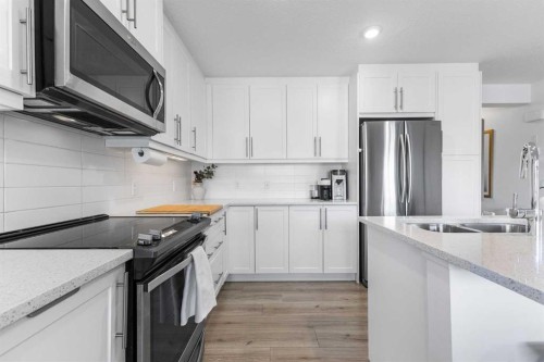 443 Sage Hill Grove Nw, Calgary, AB - Indoor Photo Showing Kitchen With Double Sink With Upgraded Kitchen
