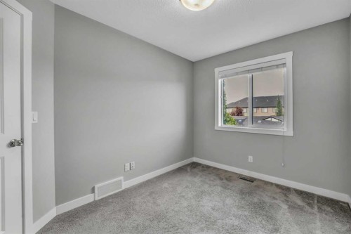 315 Hillcrest Drive Sw, Airdrie, AB - Indoor Photo Showing Other Room