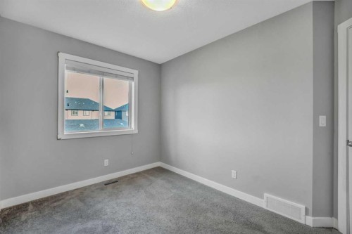 315 Hillcrest Drive Sw, Airdrie, AB - Indoor Photo Showing Other Room