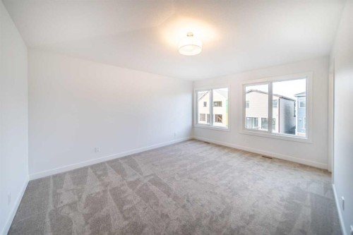 73 Royston Grove Nw, Calgary, AB - Indoor Photo Showing Other Room