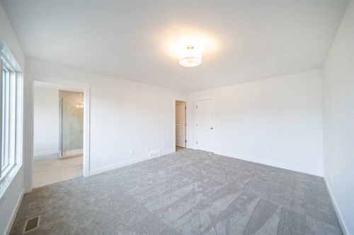 73 Royston Grove Nw, Calgary, AB - Indoor Photo Showing Other Room