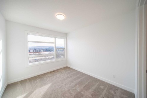 73 Royston Grove Nw, Calgary, AB - Indoor Photo Showing Other Room