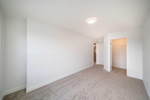 73 Royston Grove Nw, Calgary, AB - Indoor Photo Showing Other Room
