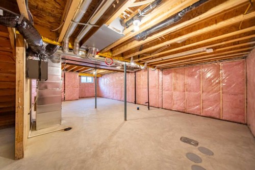 73 Royston Grove Nw, Calgary, AB - Indoor Photo Showing Basement