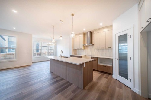 73 Royston Grove Nw, Calgary, AB - Indoor Photo Showing Kitchen With Upgraded Kitchen