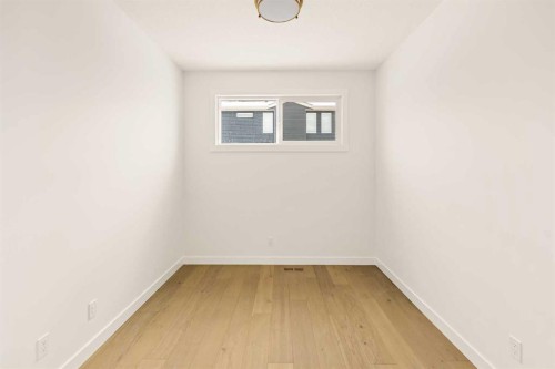 529 Lucas Way Nw, Calgary, AB - Indoor Photo Showing Other Room