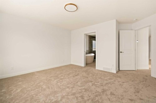529 Lucas Way Nw, Calgary, AB - Indoor Photo Showing Other Room