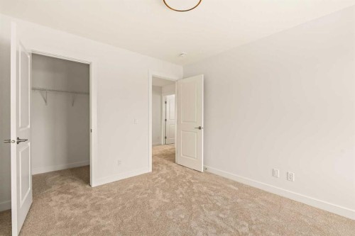 529 Lucas Way Nw, Calgary, AB - Indoor Photo Showing Other Room