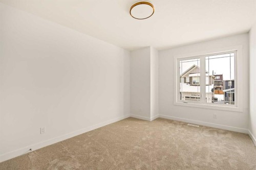 529 Lucas Way Nw, Calgary, AB - Indoor Photo Showing Other Room