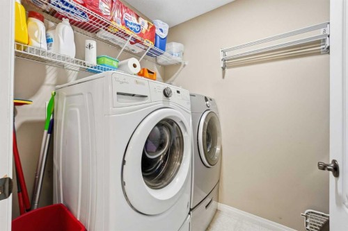 23 Prestwick Park Se, Calgary, AB - Indoor Photo Showing Laundry Room