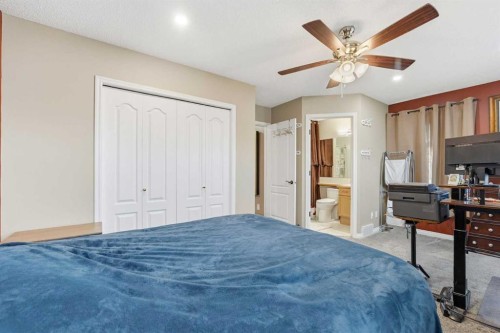 23 Prestwick Park Se, Calgary, AB - Indoor Photo Showing Bedroom