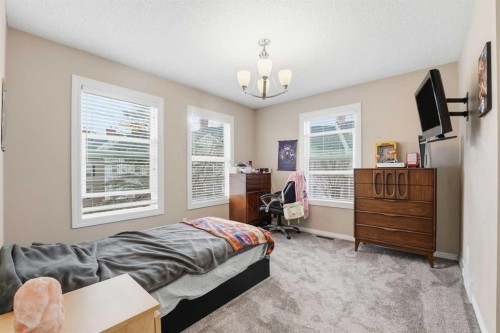 23 Prestwick Park Se, Calgary, AB - Indoor Photo Showing Bedroom